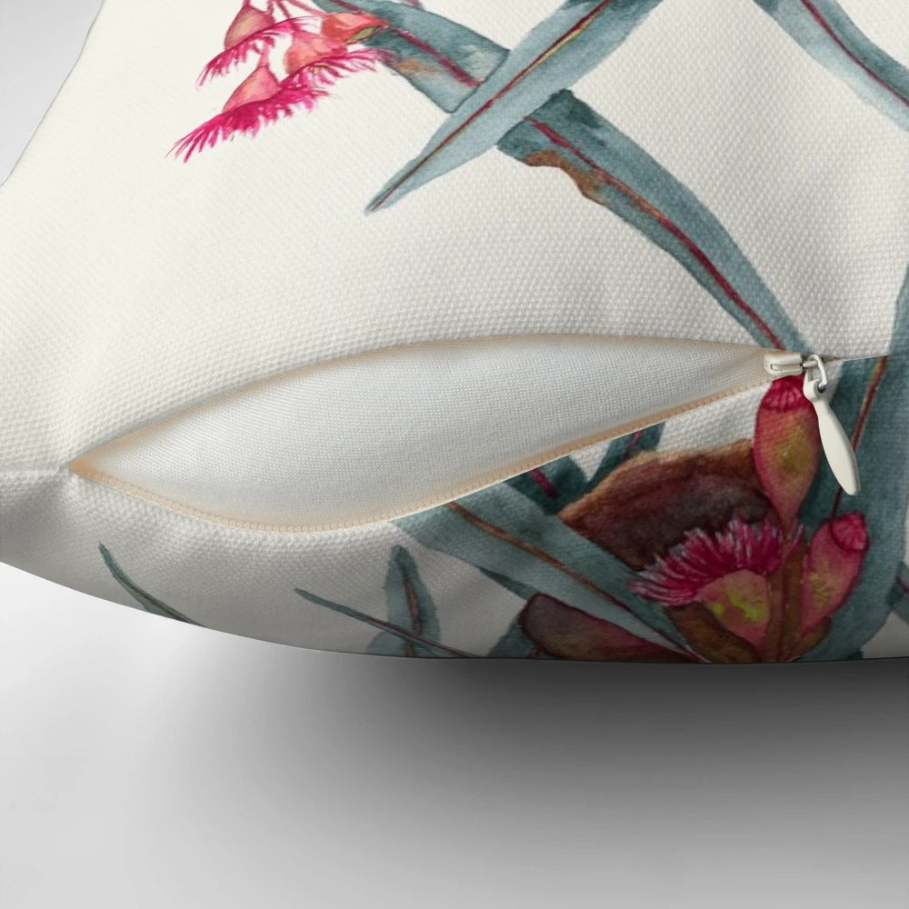 A cozy, nature-inspired pillow with eucalyptus leaves and flowers, perfect for relaxation.