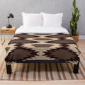 Navajo-inspired plush blanket with a southwestern pattern design