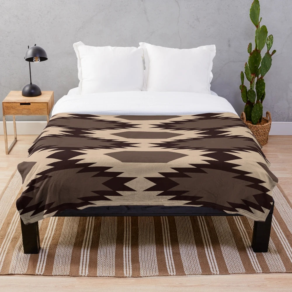 Navajo-inspired plush blanket with a southwestern pattern design
