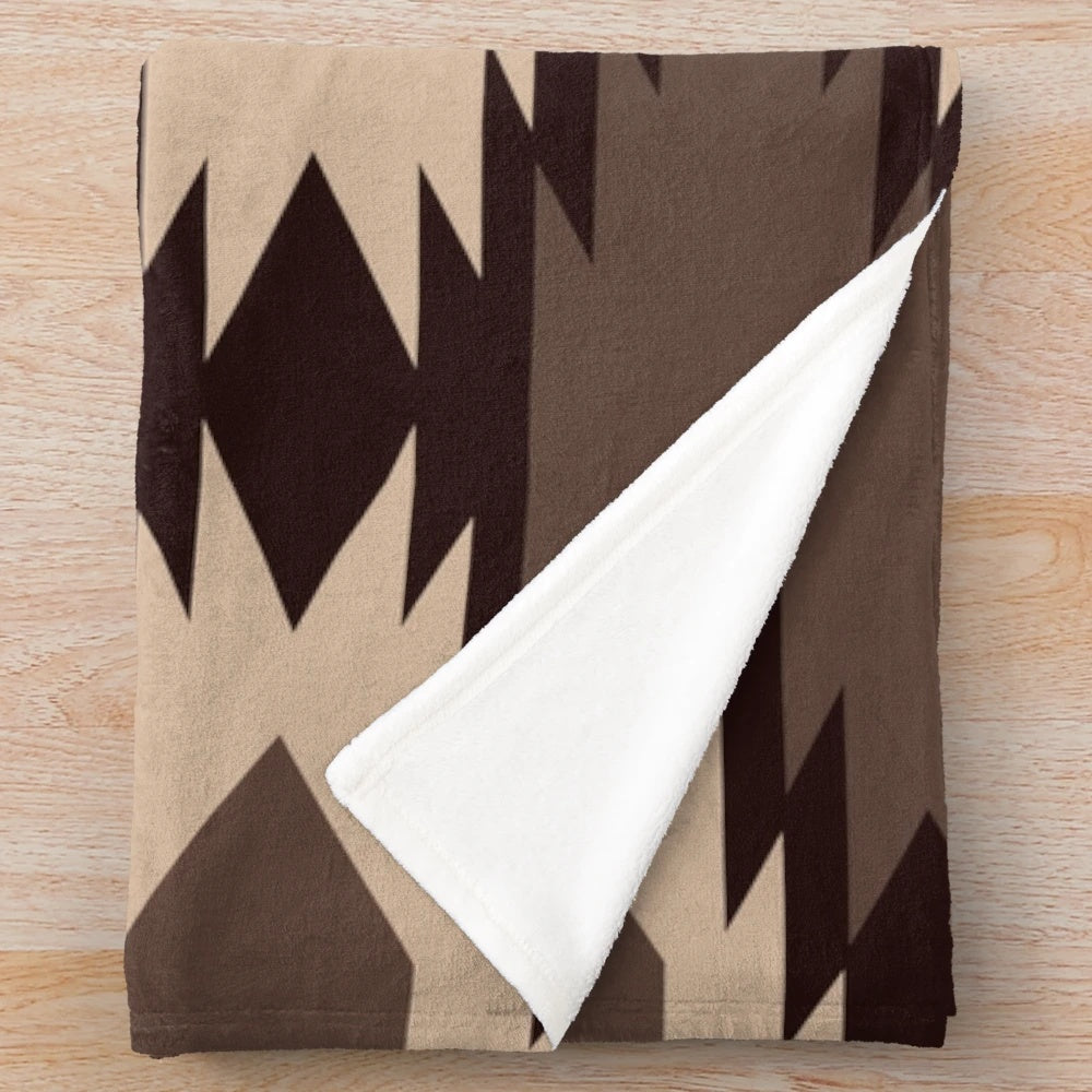 Navajo-inspired plush blanket with a southwestern pattern design