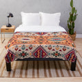 Navajo design plush blanket with geometric tribal pattern