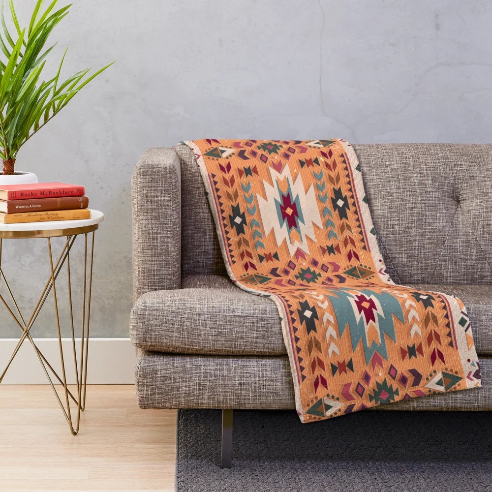 Navajo design plush blanket with geometric tribal pattern