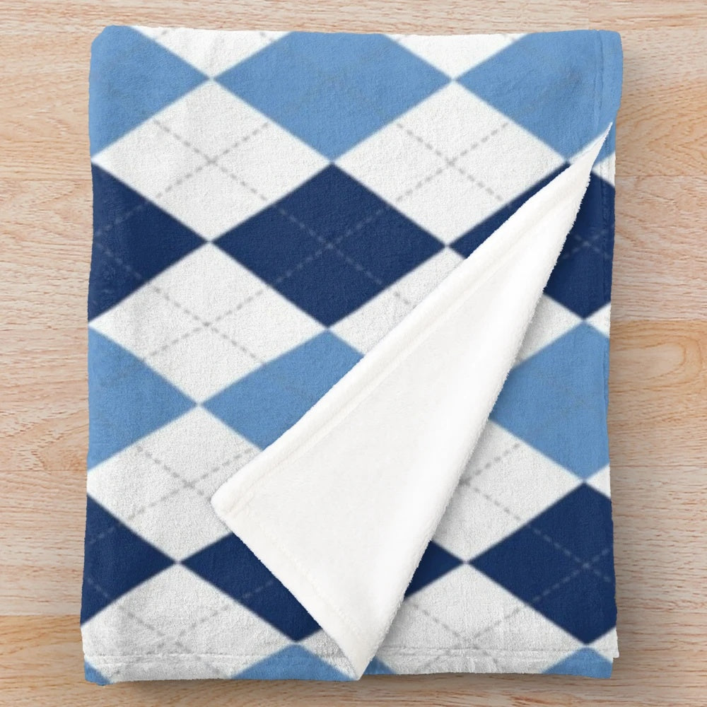 Navy and Carolina argyle pattern plush blanket