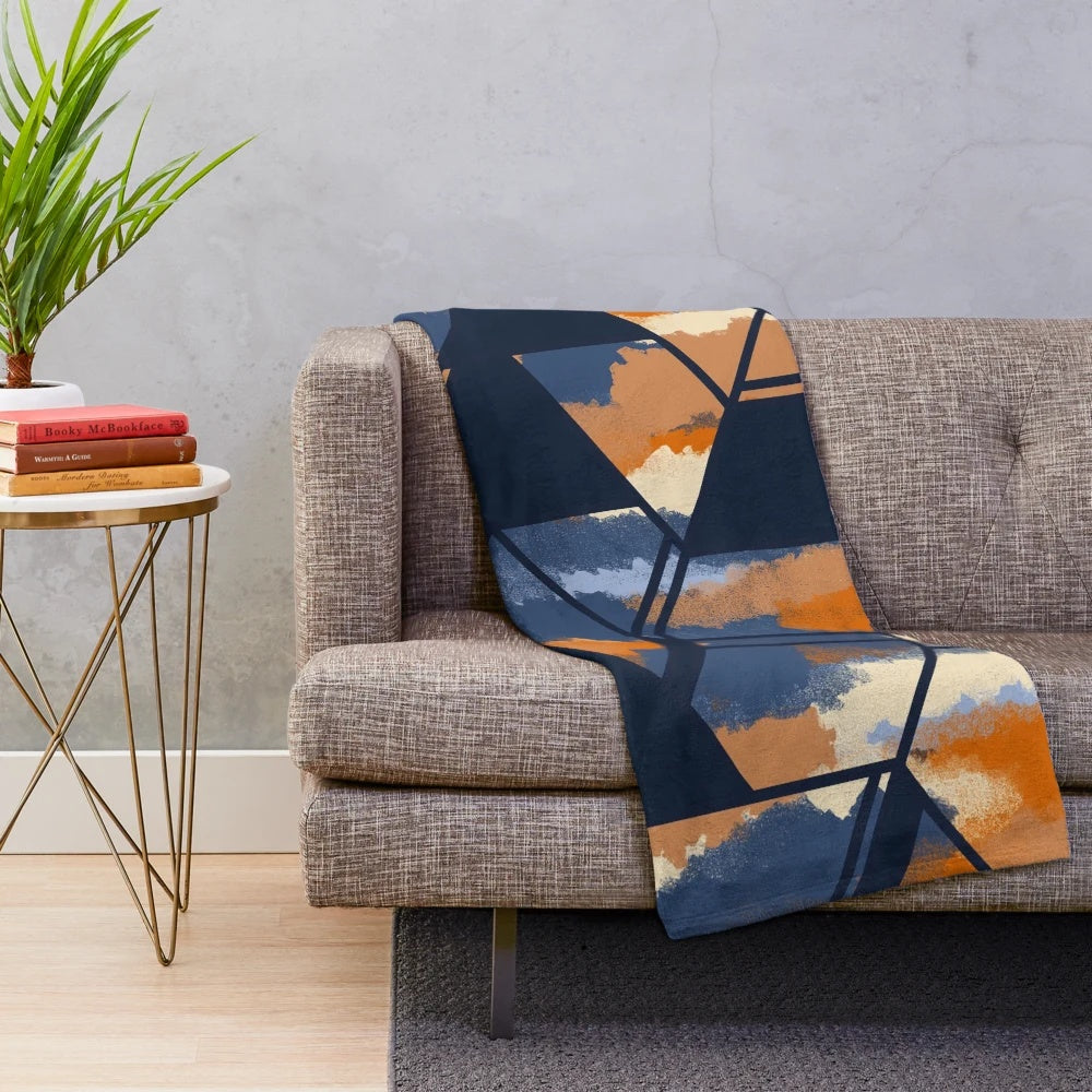 Navy and orange geometric pattern plush blanket