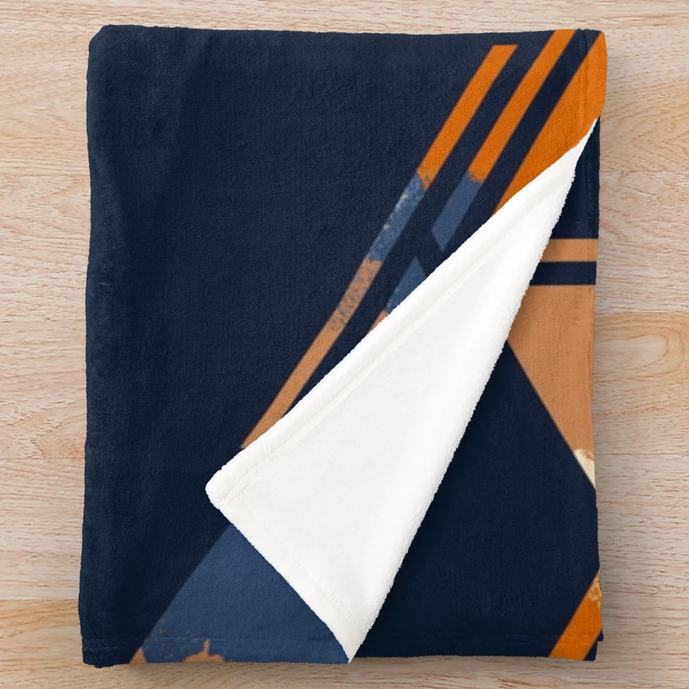 Navy and orange geometric pattern plush blanket