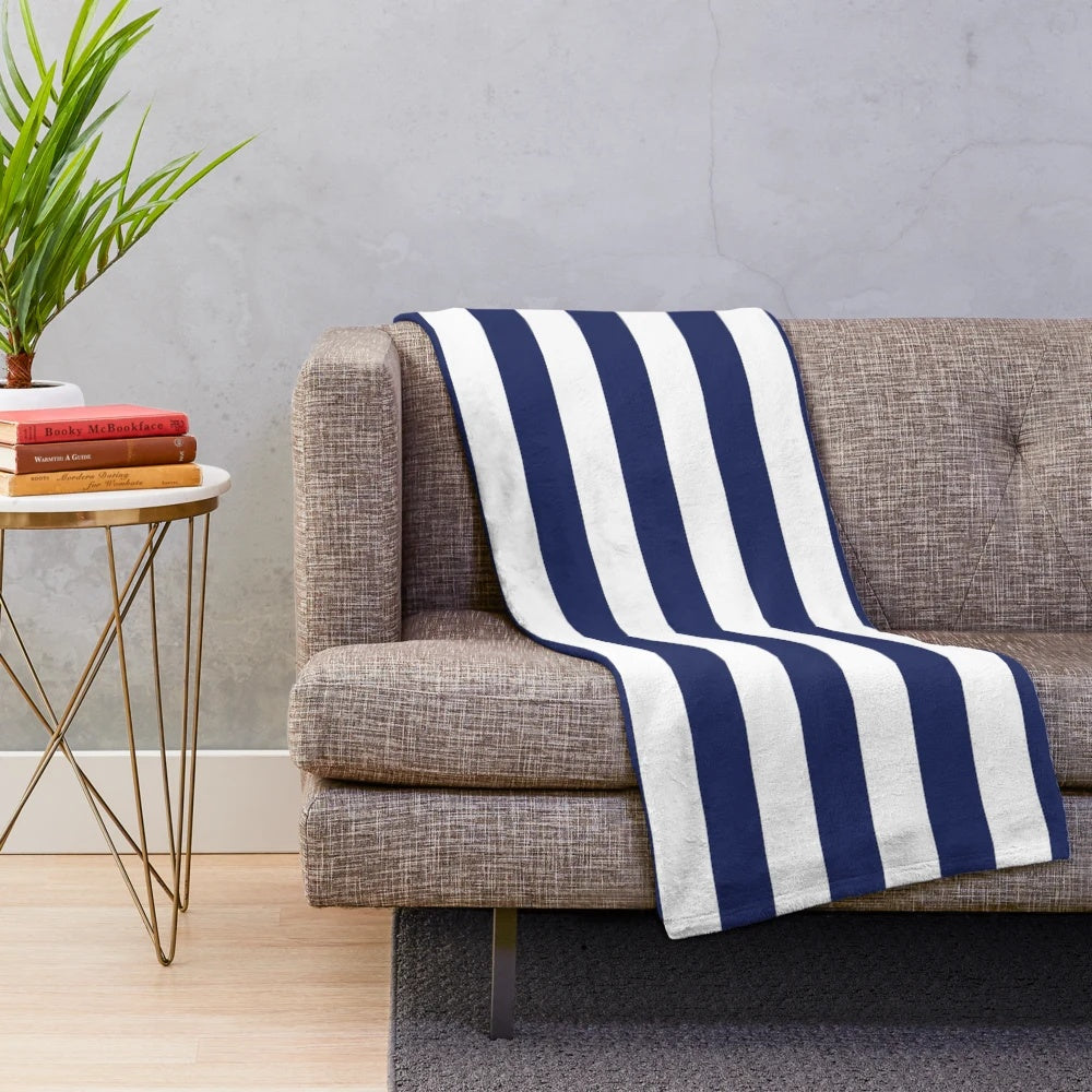 Navy blue and white striped plush blanket