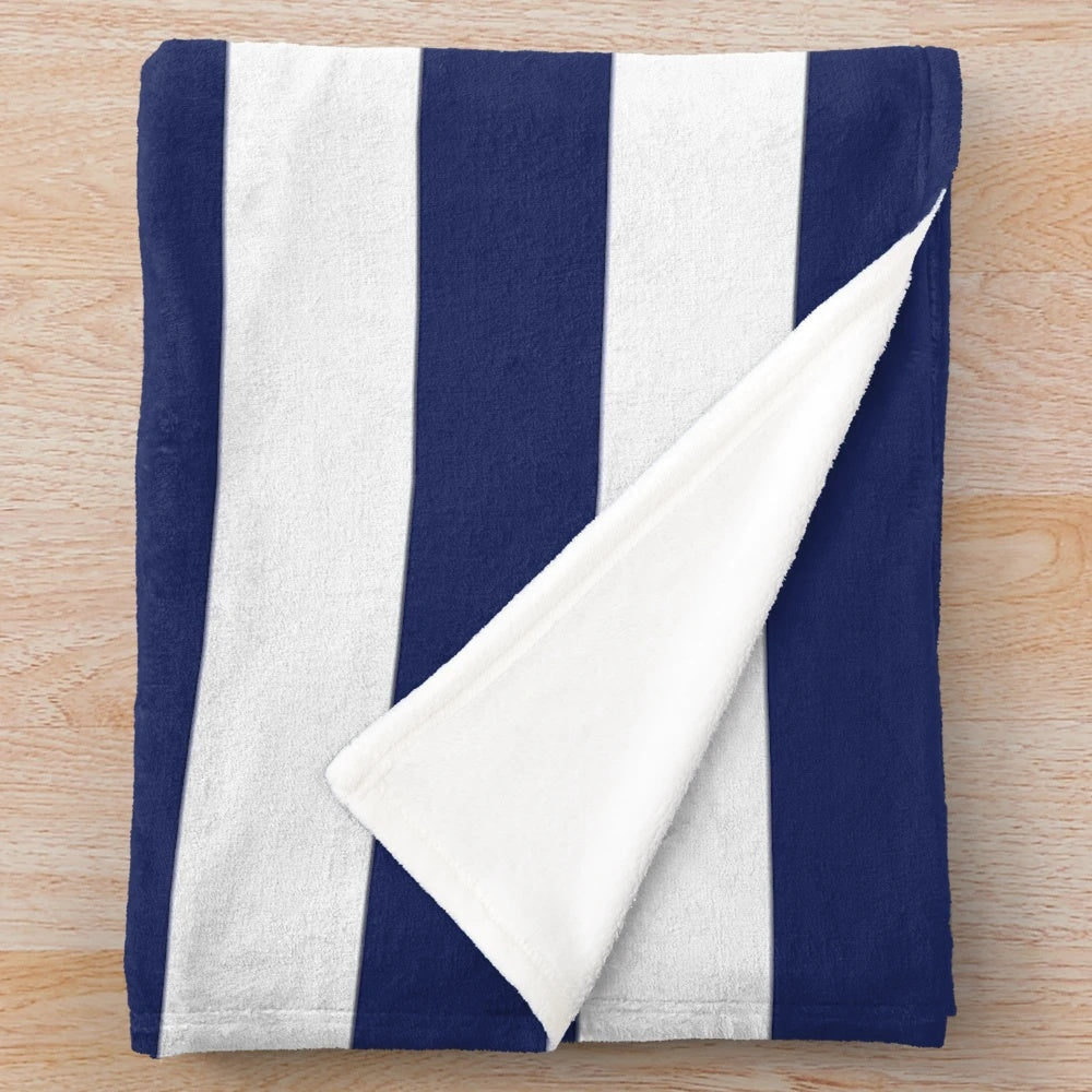 Navy blue and white striped plush blanket