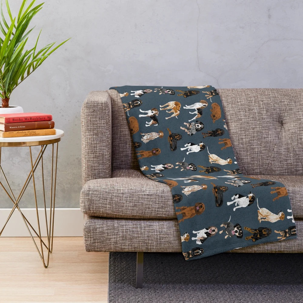 Navy blue plush blanket featuring a pack of coonhounds