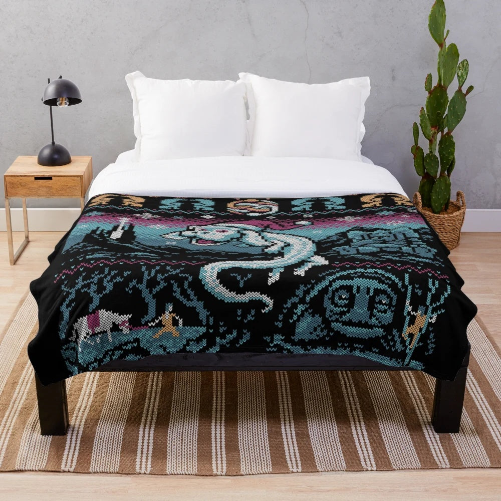 Neverending Story-inspired plush blanket with Falcor and Atreyu design