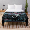 Neverending Story-inspired plush blanket with Falcor and Atreyu design