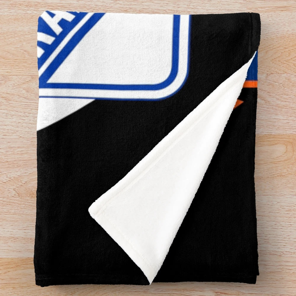 Plush blanket with New York sports team designs
