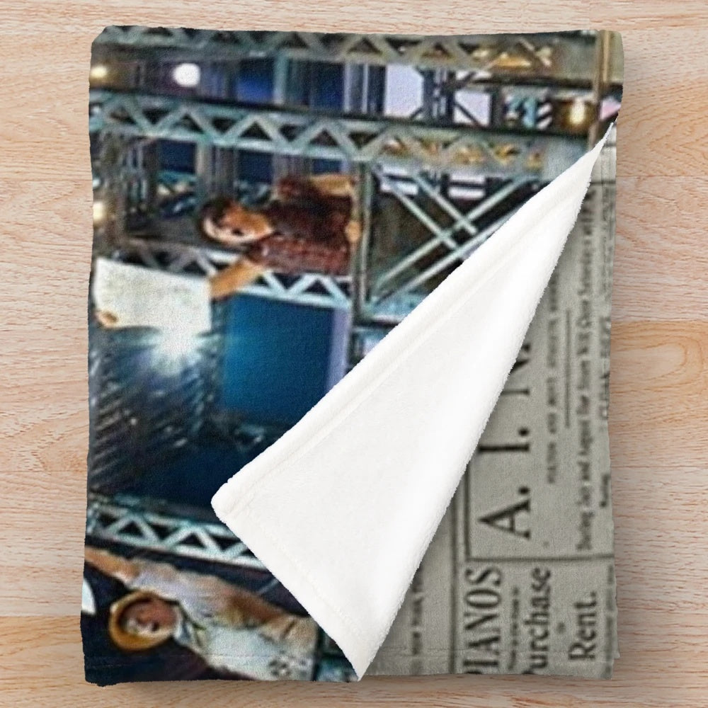 Newsies plush blanket with musical theater collage design