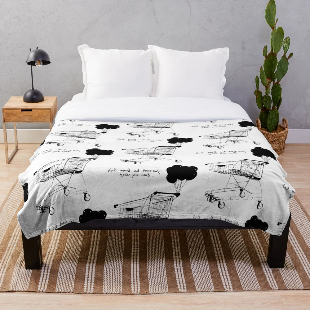 NF plush blanket featuring a cozy and soft design