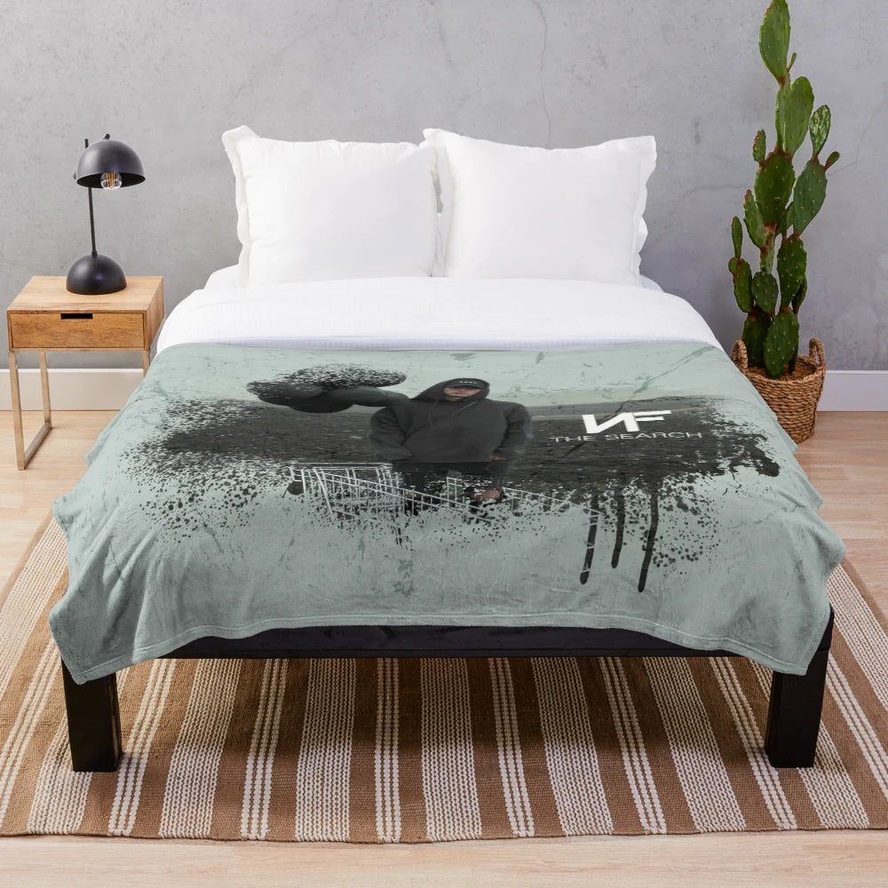 Nf "The Search" plush blanket with a dark and cozy design