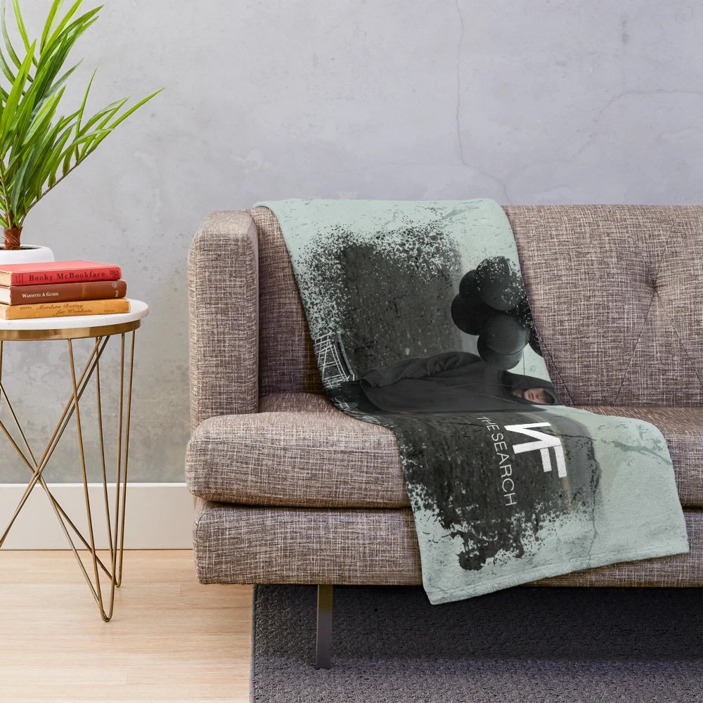 Nf "The Search" plush blanket with a dark and cozy design