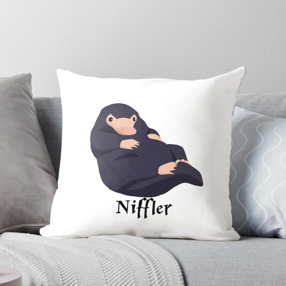 Soft, plush Niffler pillow inspired by the beloved magical creature from the Harry Potter universe