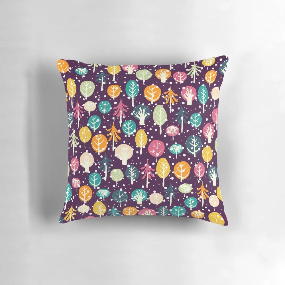 Soft, plush pillow featuring a winter forest scene with fir trees, snow, and snowflakes
