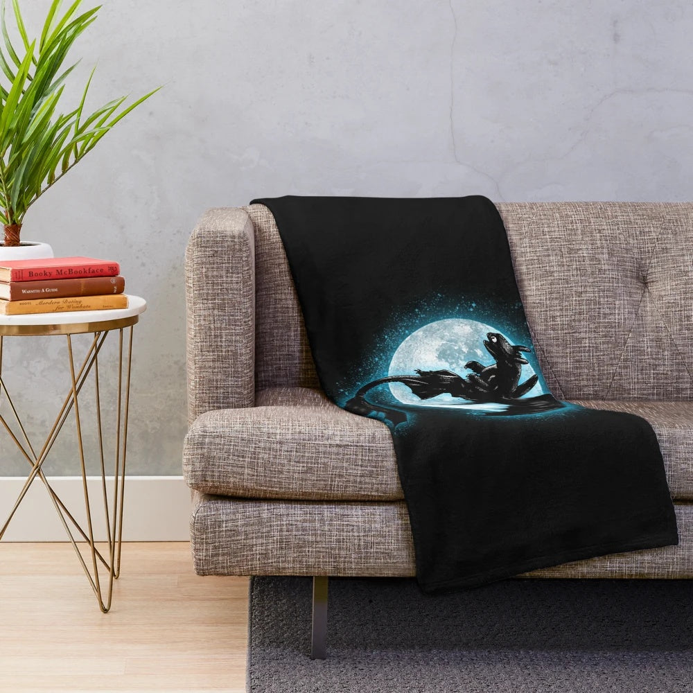 Cozy black dragon plush blanket with Toothless the Night Fury from How to Train Your Dragon
