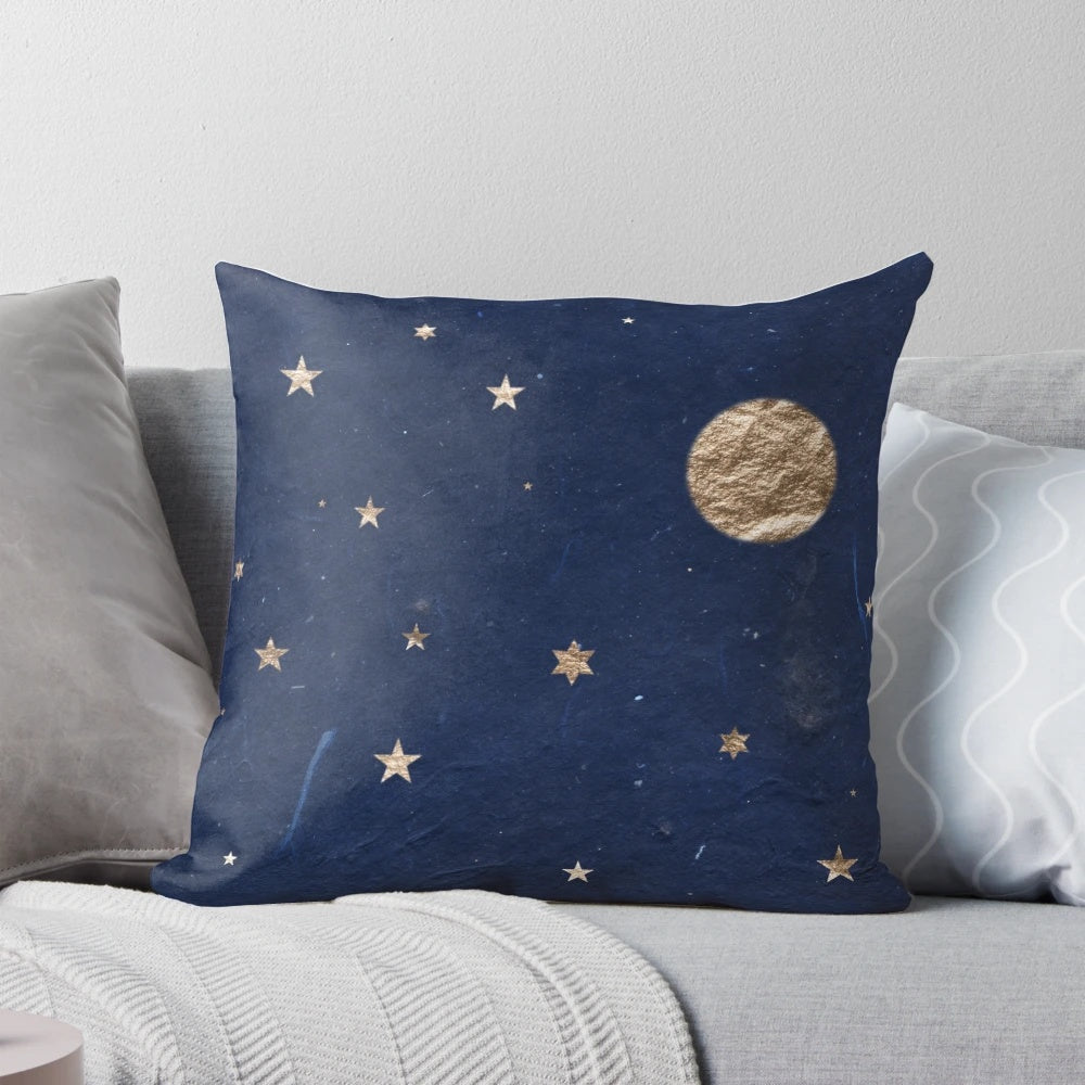 Soft, plush pillow featuring a night sky design with the moon and twinkling stars