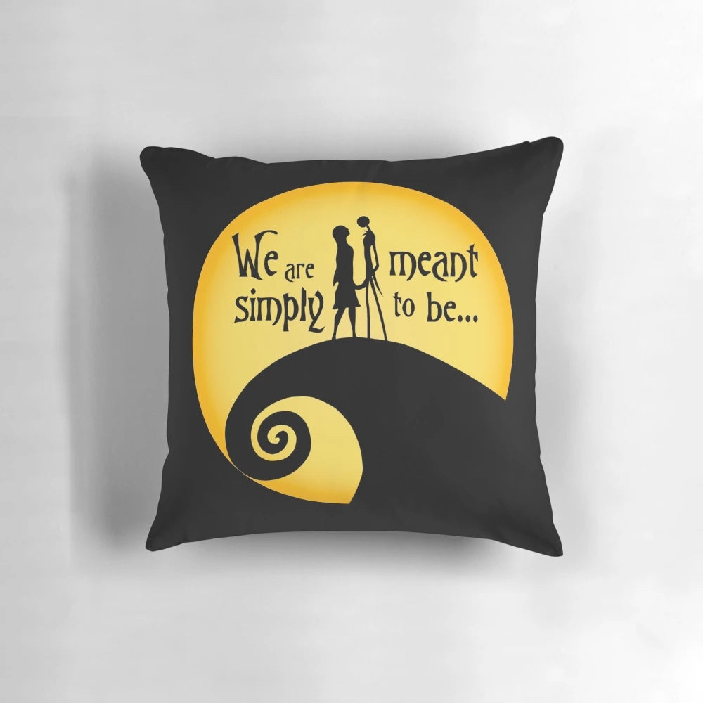 A pillow featuring the iconic characters Jack and Sally from The Nightmare Before Christmas.