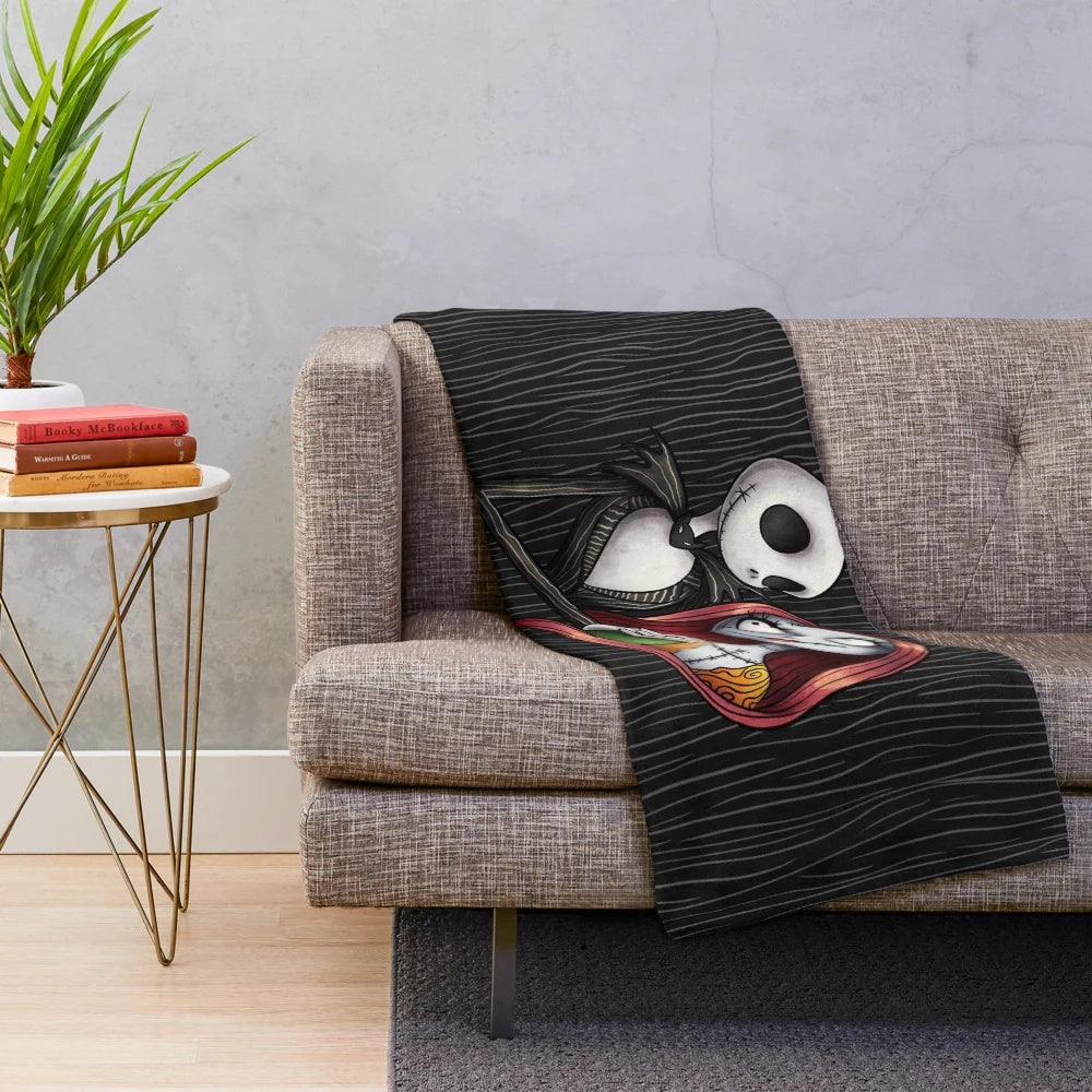 Soft and snuggly plush blanket featuring the gothic couple Jack Skellington and Sally from The Nightmare Before Christmas