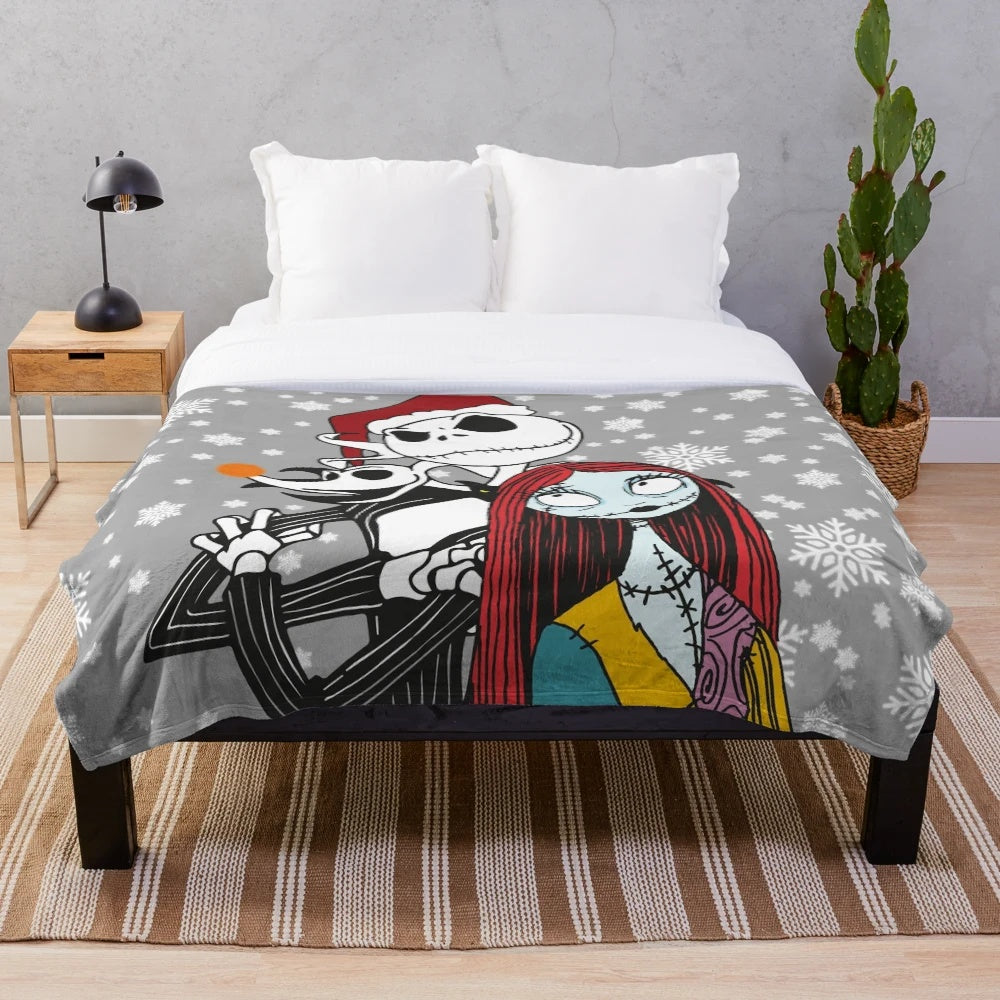 Jack Skellington, Sally, and Zero from The Nightmare Before Christmas on a plush blanket