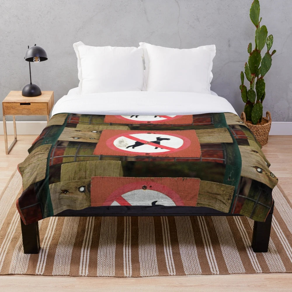 Soft and cuddly plush blanket with a "No Dogs" design
