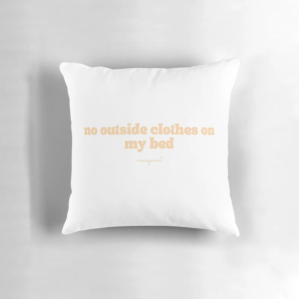Soft, comfortable pillow with "no outside clothes on bed" design for cozy bedroom decor