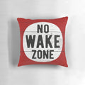 Soft, plush pillow with a no wake zone sign design, perfect for lake house decor or gift for boating enthusiasts.