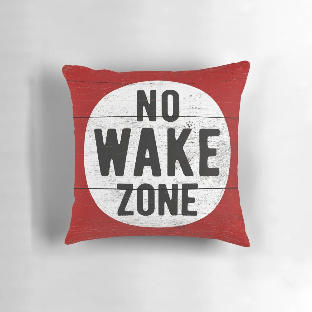 Soft, plush pillow with a no wake zone sign design, perfect for lake house decor or gift for boating enthusiasts.