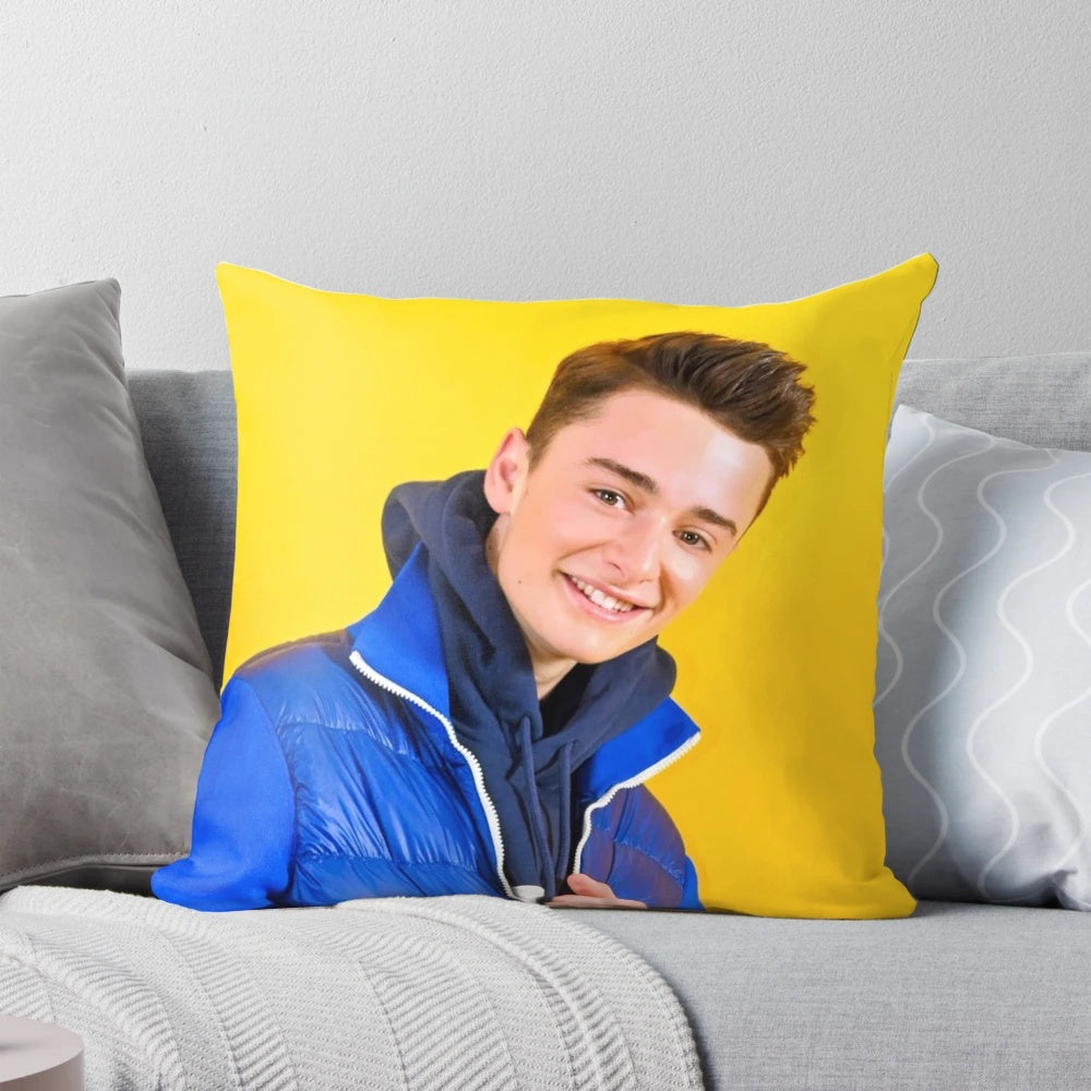 A plush blue jacket-themed pillow inspired by the character Will Byers from the popular Netflix series Stranger Things.