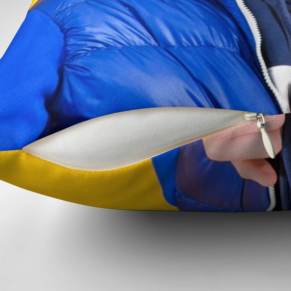 A plush blue jacket-themed pillow inspired by the character Will Byers from the popular Netflix series Stranger Things.