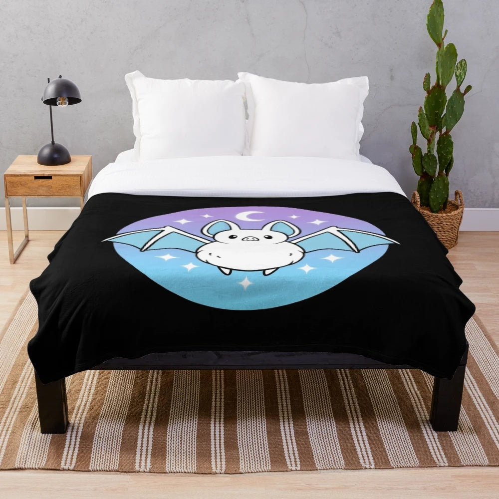 Soft and fluffy plush blanket featuring a cute bat design