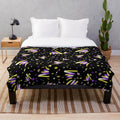 Nonbinary pride plush blanket with retro arcade carpet pattern