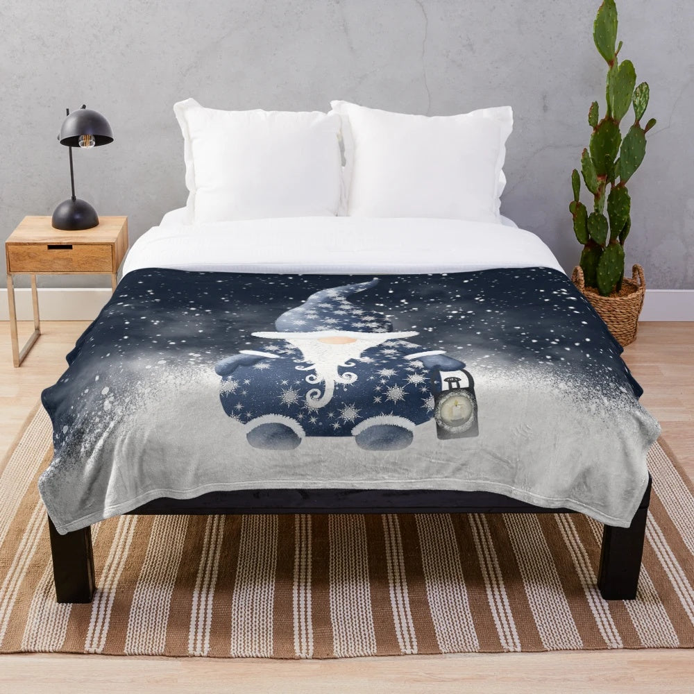 A soft, plush blanket featuring a cute Nordic gnome design with snowflakes