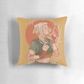 A soft, white pillow featuring a beautiful design of the singer Aurora Aksnes against a nature-inspired backdrop.