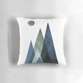 A navy blue and hunter green minimalist mountain art pillow with a simple, modern design.