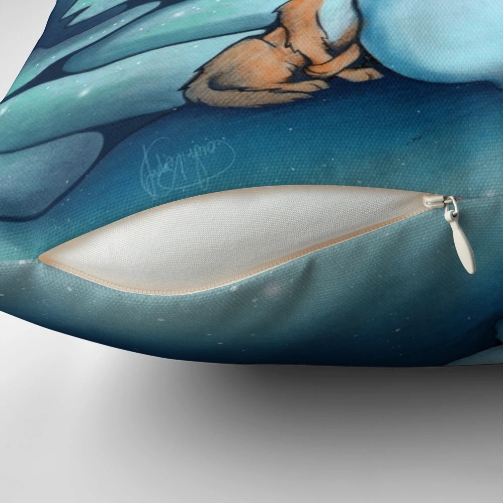A soft, decorative pillow featuring a whimsical illustration of the northern lights, snow, and winter wildlife.
