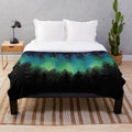 Plush blanket featuring a northern lights nature scene