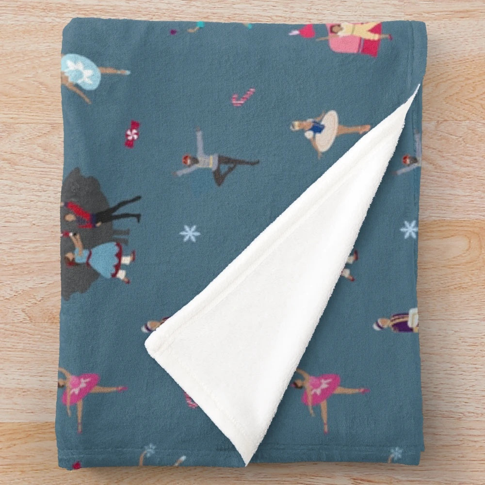 Blue plush blanket with nutcracker ensemble design