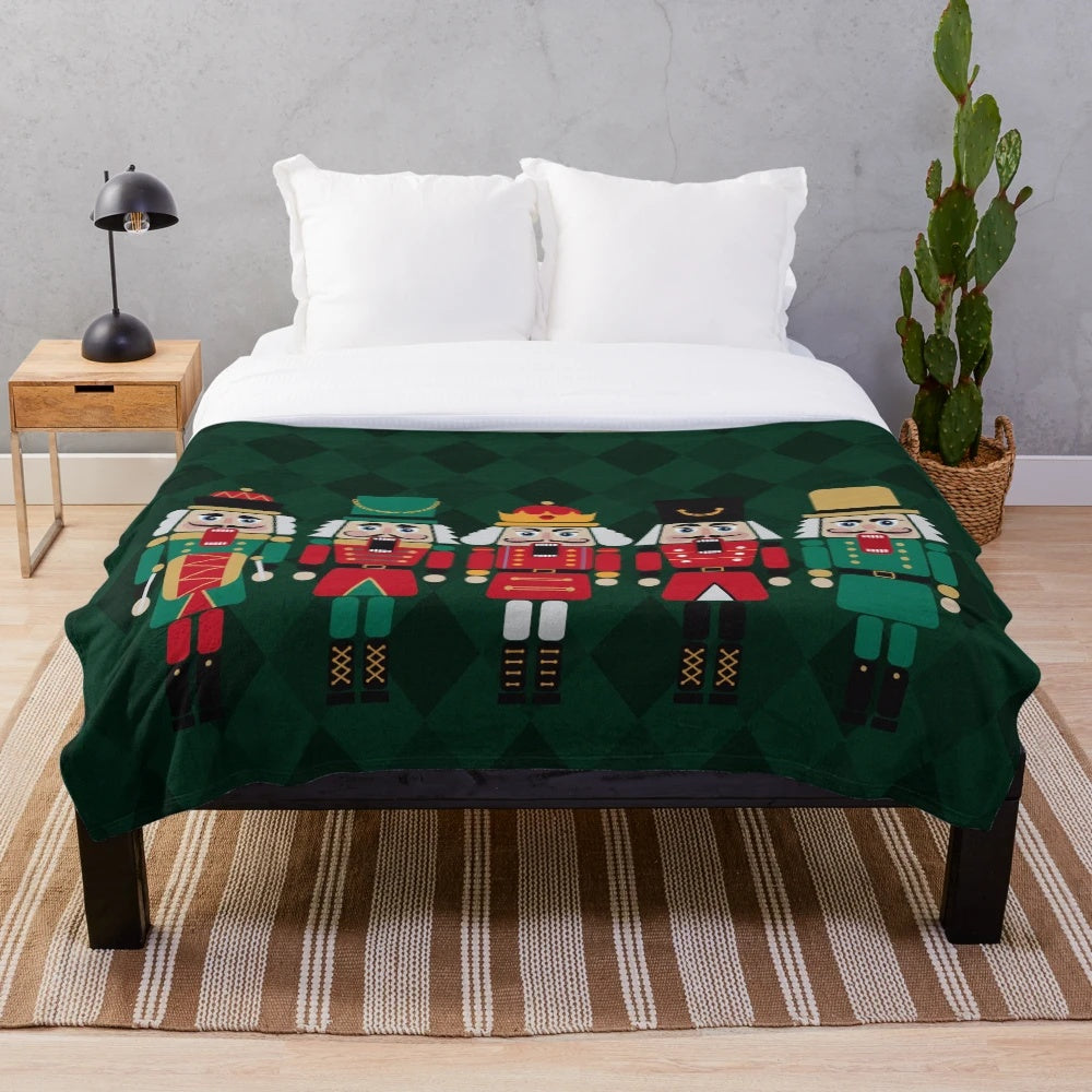 Nutcracker-inspired plush blanket with a diamond pattern design