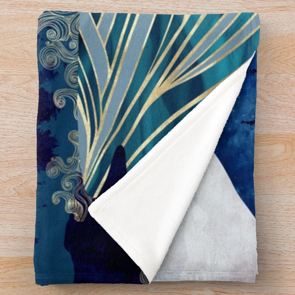 Ocean sunrise-inspired plush blanket with vibrant colors and abstract landscape design