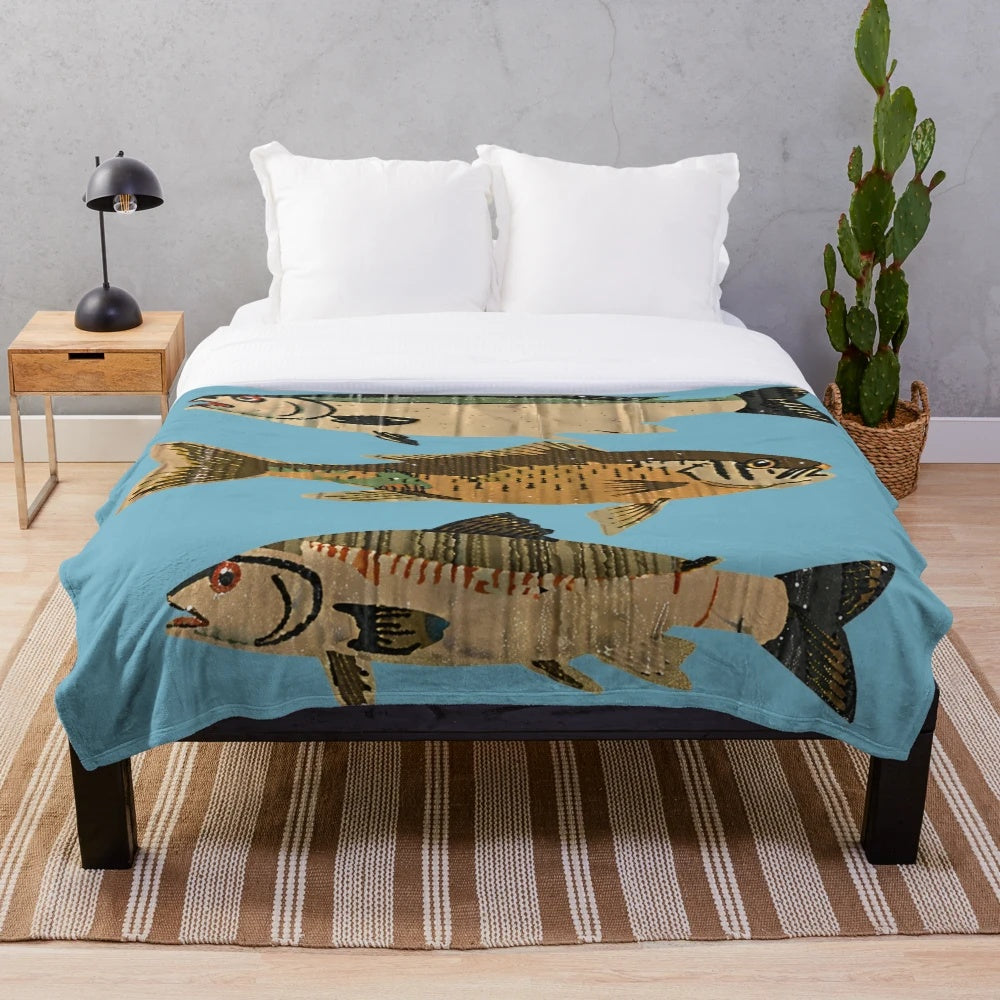 Cozy plush blanket featuring an ocean and sea creature design