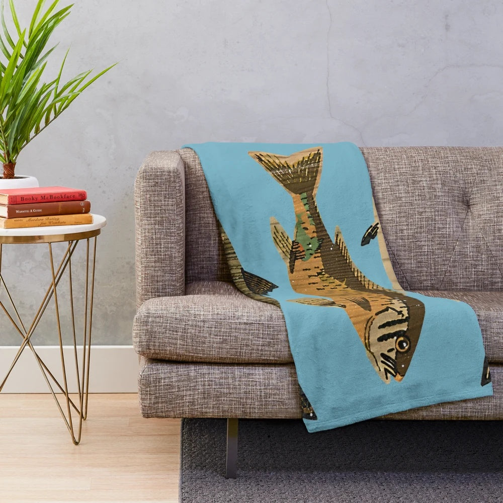 Cozy plush blanket featuring an ocean and sea creature design