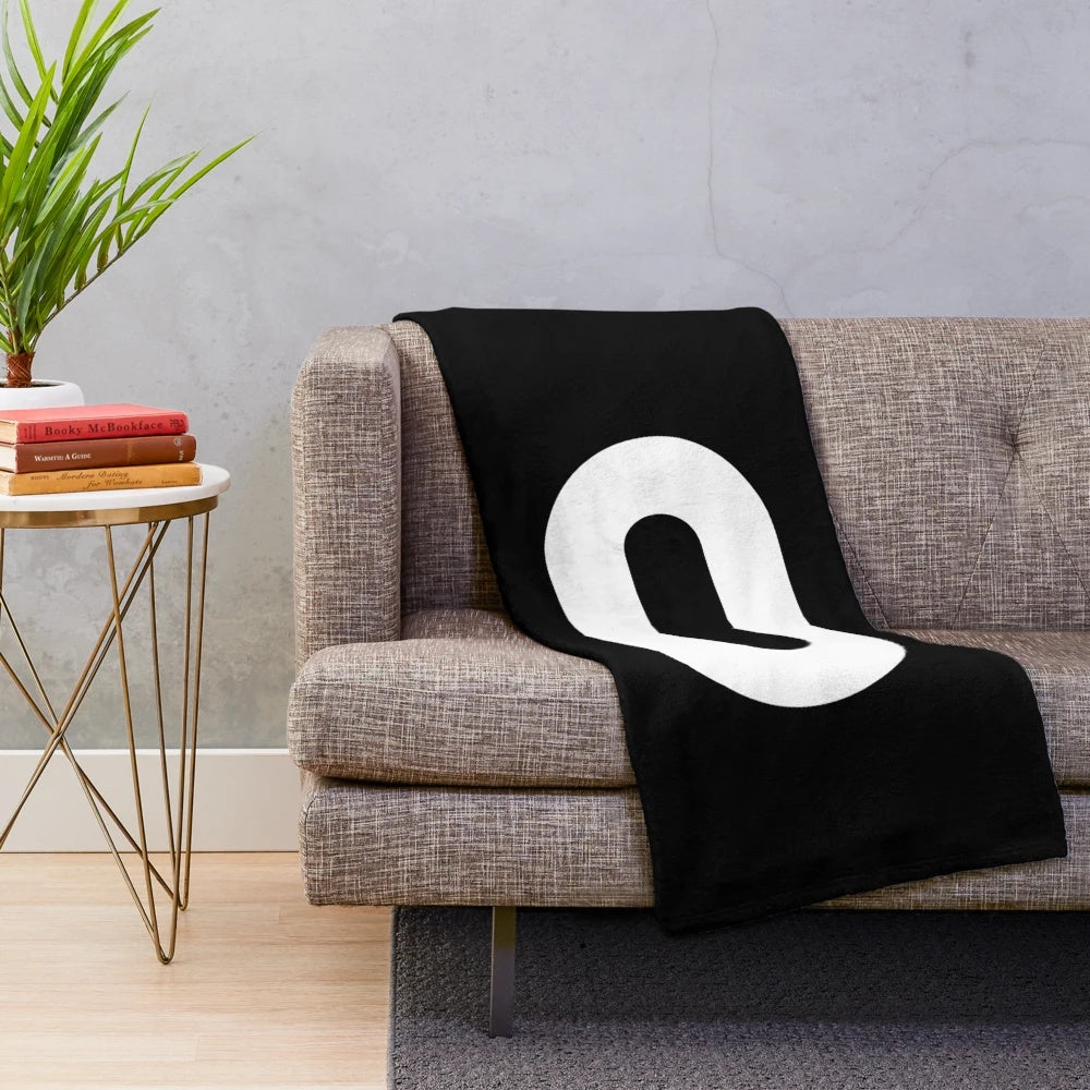 Oculus-inspired plush blanket featuring the Oculus logo in white