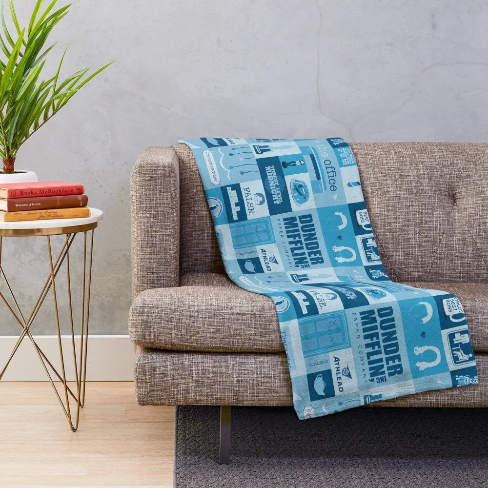 Soft and plush blanket featuring characters from the popular TV show "The Office