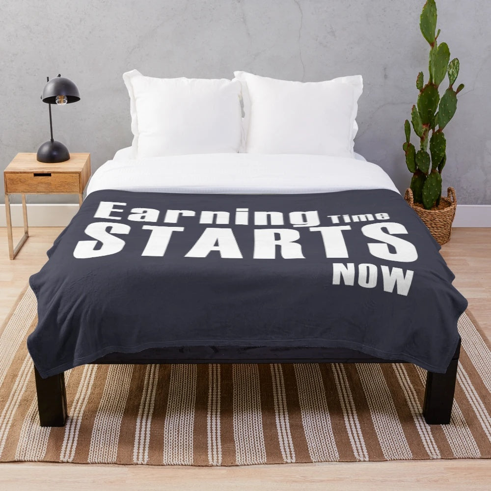 Plush blanket with The Office-inspired design