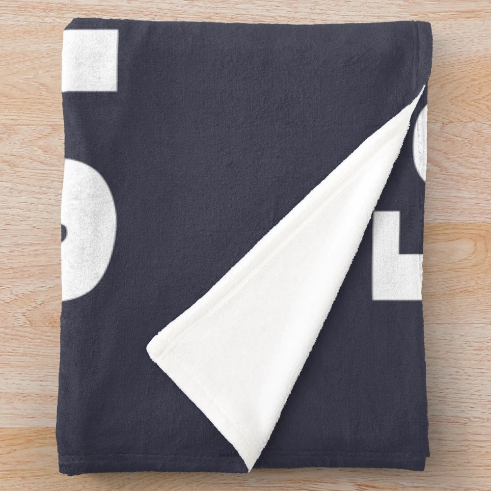 Plush blanket with The Office-inspired design