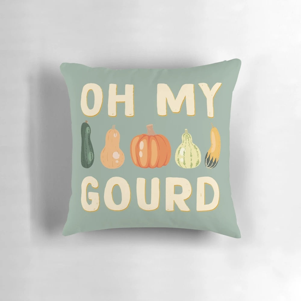 Whimsical "Oh My Gourd" decorative throw pillow featuring a pumpkin or gourd graphic and autumn-inspired typography