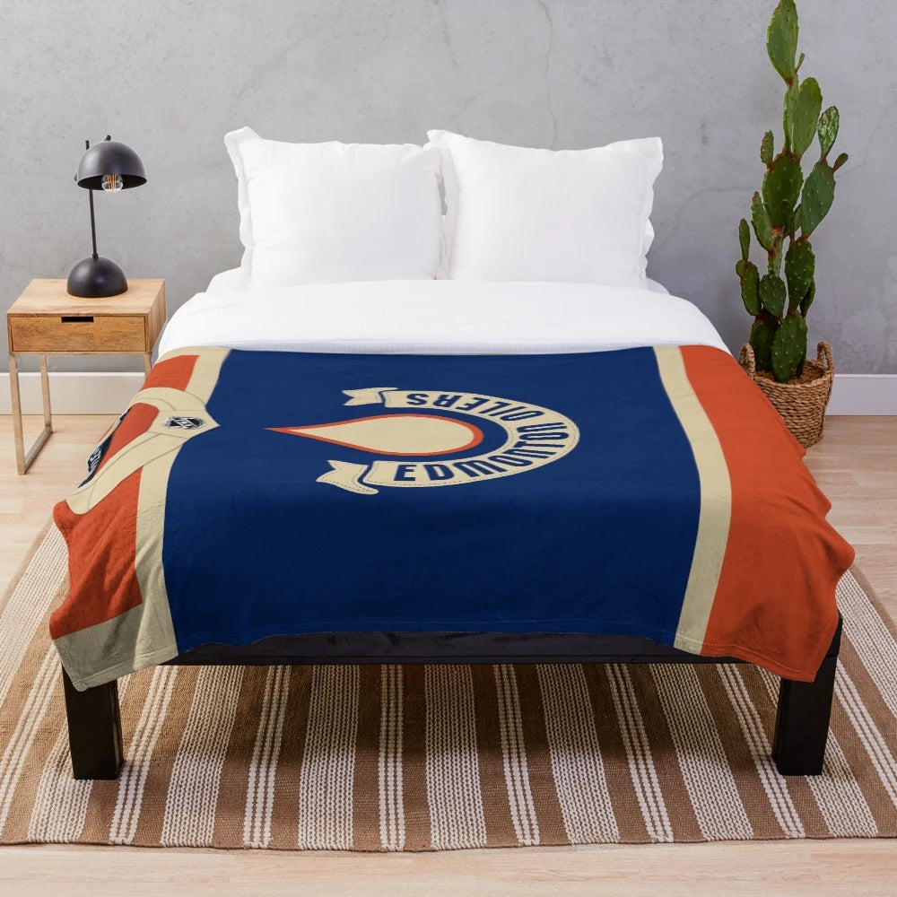 Edmonton Oilers inspired plush blanket with heritage classic jersey design